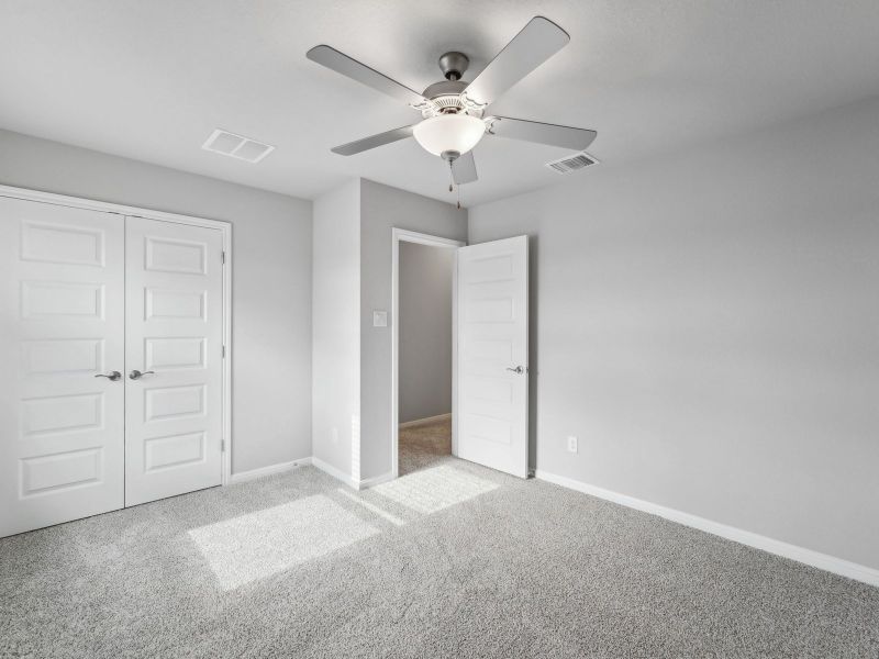 Spacious, unfurnished interior of a new home in Riverbend at Double Eagle - Boulevard Collection, Cedar Creek (Image 12).