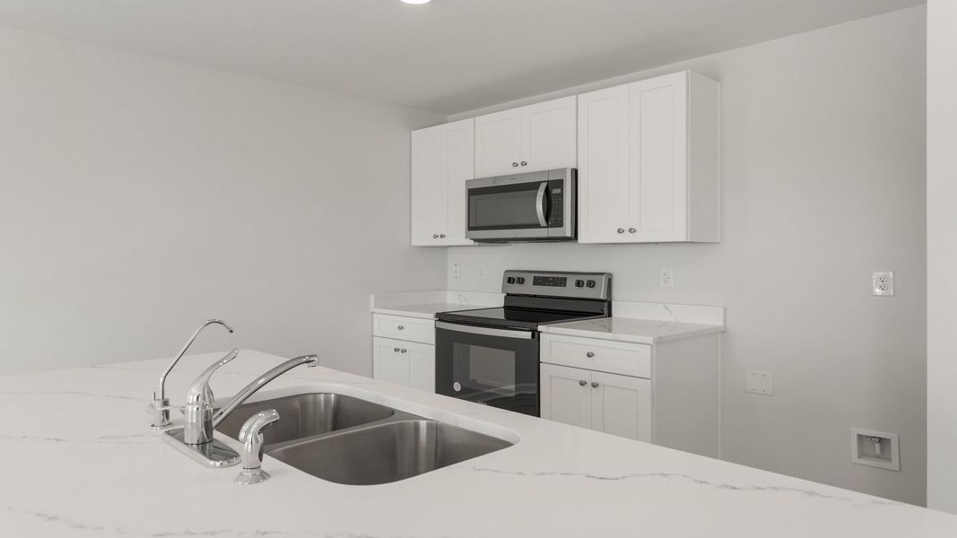 Representative furnished interior of a home built from the The Freeport by D.R. Horton in Hodges Bayou Plantation, Panama City (Image 7). Representative furnished interior of a home built from the The Freeport by D.R. Horton in Hodges Bayou Plantation, Panama City (Image 7).