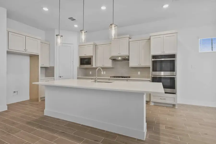 Furnished interior view inside a new home in Grange, Katy (Image 5).