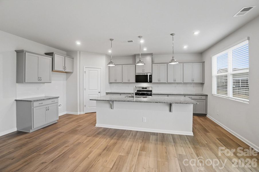 Furnished interior view inside a new home in Waxhaw Landing, Monroe (Image 6).
