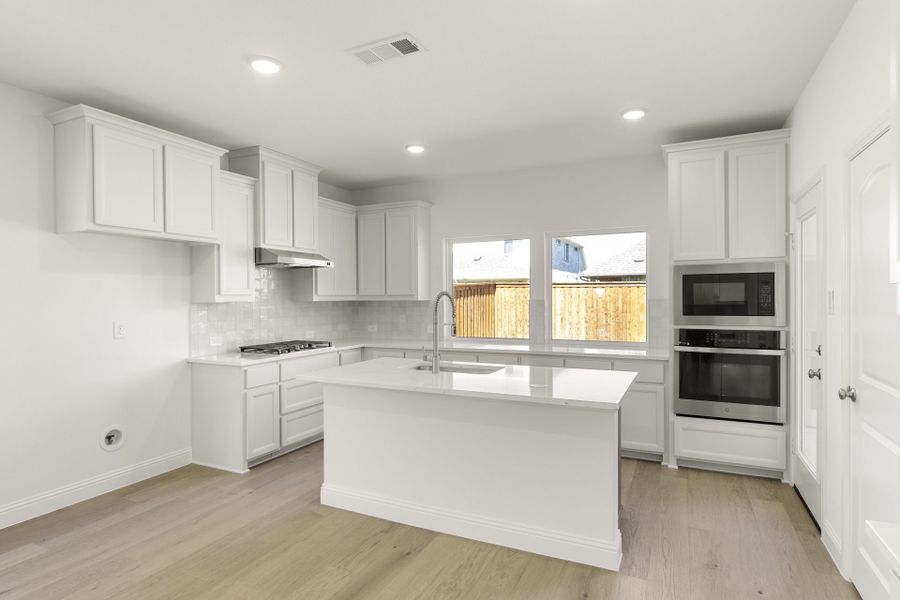 Furnished interior view inside a new home in The Reserve at Spiritas Ranch, Little Elm (Image 5).