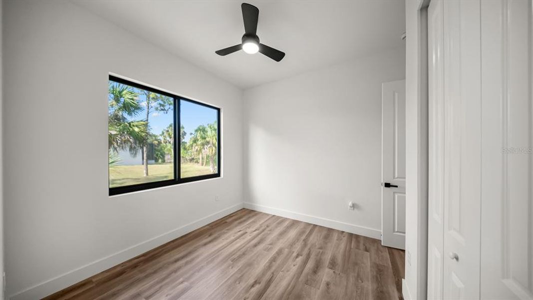 Spacious, unfurnished interior of a new home in , Port Charlotte (Image 28).