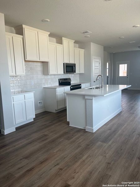 Furnished interior view inside a new home in Highland Ridge, New Braunfels (Image 5). Furnished interior view inside a new home in Highland Ridge, New Braunfels (Image 5).