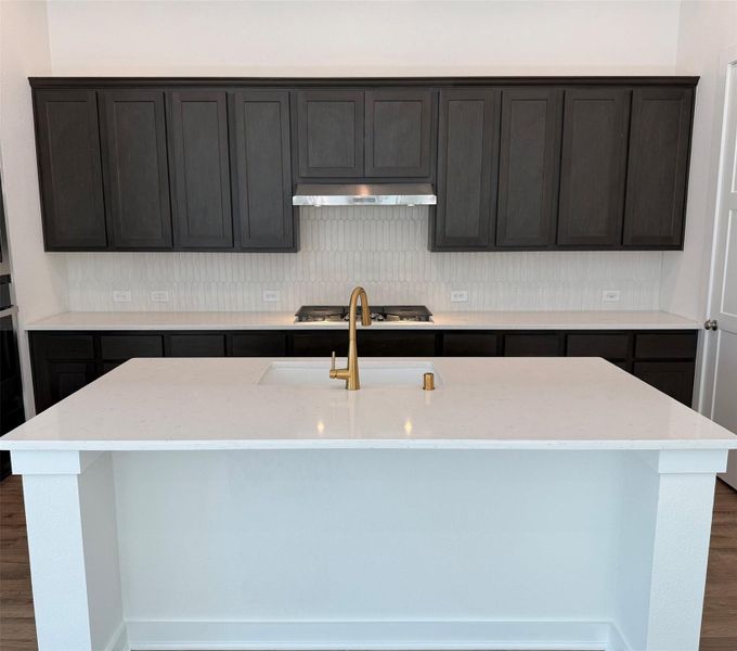 Kitchen with updated backsplash
