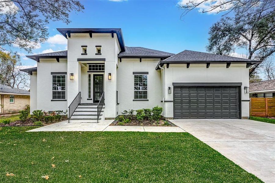 15505 Shanghai Street is a 1 story home with 4 spacious bedrooms, 3 bathrooms and an attached 3-car tandem garage located in Jersey Village. Curb appeal is A+ with a modern stucco exterior, double pane windows and professional landscape.