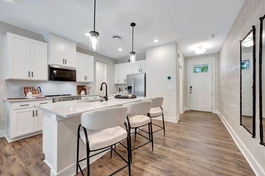 Representative furnished interior of a home built from the Hallie by Mattamy Homes in Ashmore Townes, Garner (Image 4). Representative furnished interior of a home built from the Hallie by Mattamy Homes in Ashmore Townes, Garner (Image 4).