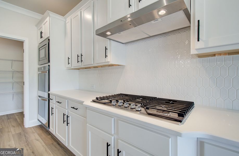 Furnished interior view inside a new home in Rosewood Lake Preserve, Hoschton (Image 8). Furnished interior view inside a new home in Rosewood Lake Preserve, Hoschton (Image 8).