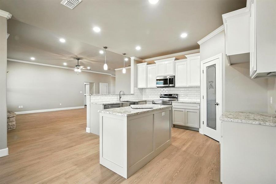 Furnished interior view inside a new home in , Abilene (Image 11).