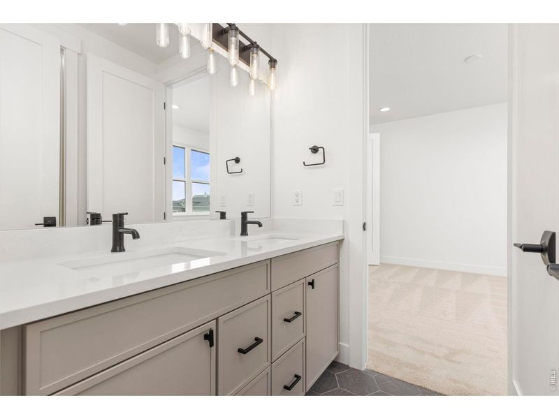 Furnished interior view inside a new home in RainDance, Windsor (Image 8).
