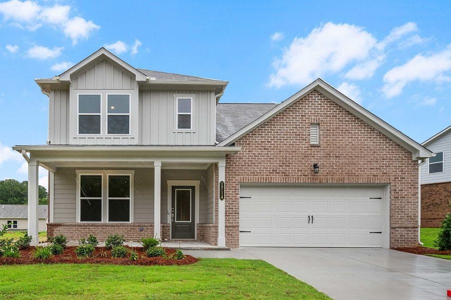 Representative exterior photo of a completed home built from the Norcross by Taylor Morrison in Windance Lake, Loganville, GA (Image 17).