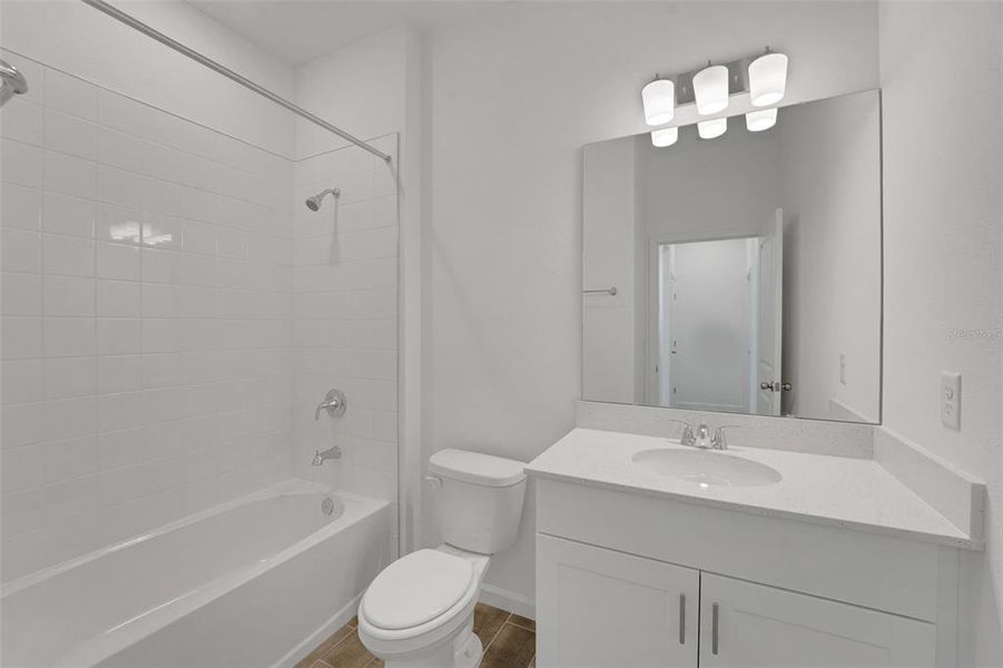 Furnished interior view inside a new home in Willowbrook North, Winter Haven (Image 8).