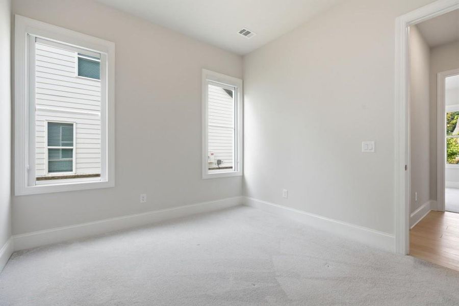 Spacious, unfurnished interior of a new home in , Woodstock (Image 21).