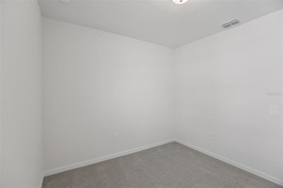 Spacious, unfurnished interior of a new home in Springs at Lake Alfred - Classic Series, Lake Alfred (Image 28).