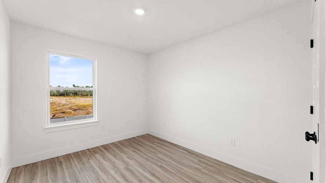 Spacious, unfurnished interior of a new home in Colonial East Townhomes, Panama City Beach (Image 24).