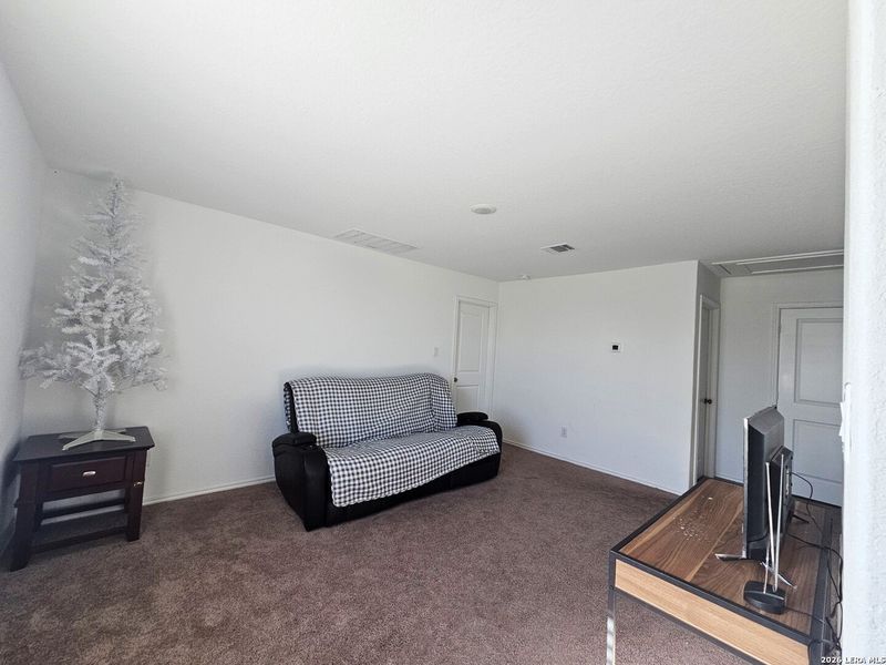Furnished interior view inside a new home in , Seguin (Image 13).