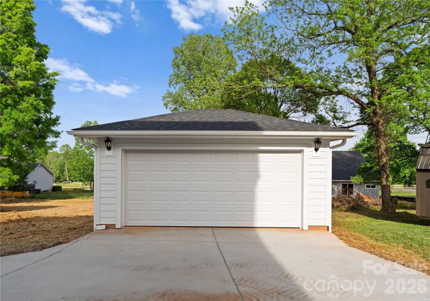 Front exterior of a new home in , Belmont, NC, highlighting curb appeal (Image 27).