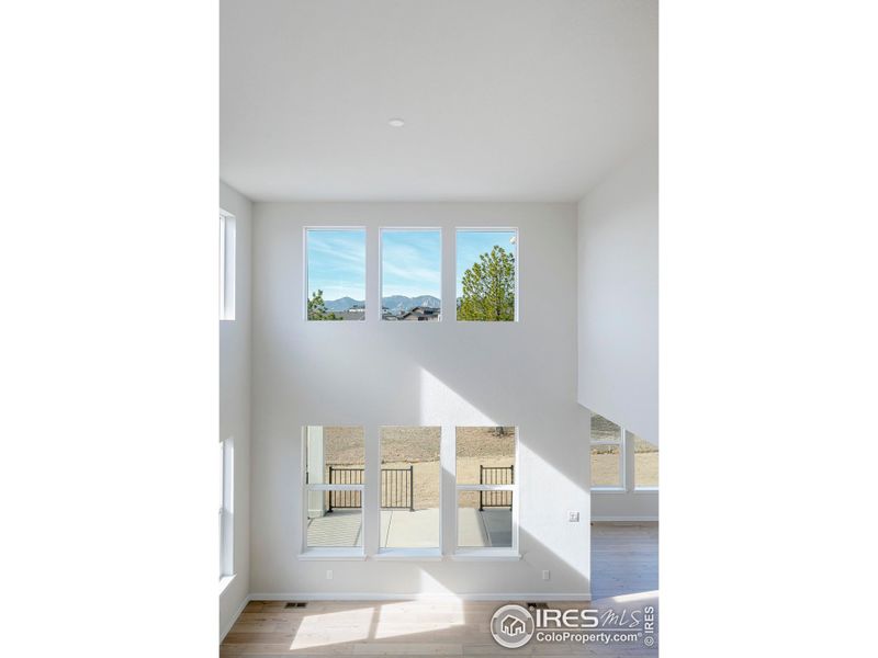 The home is flooded with natural light via the west facing two story windows