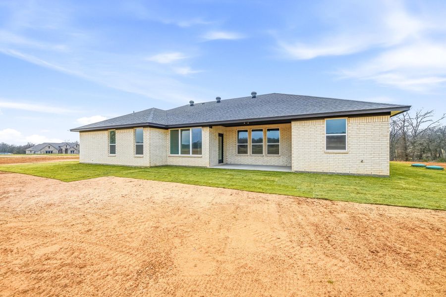 Front exterior of a new home in Taylor Ranch, Springtown, TX, highlighting curb appeal (Image 20).
