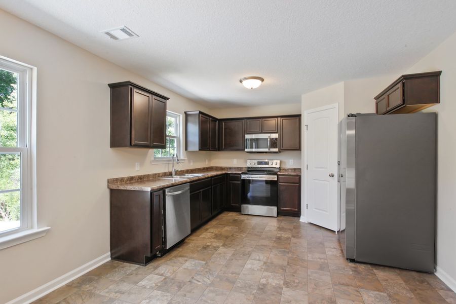 Representative furnished interior of a home built from the The Pamona by RTS Homes in Grand Reserve, Hinesville (Image 10).