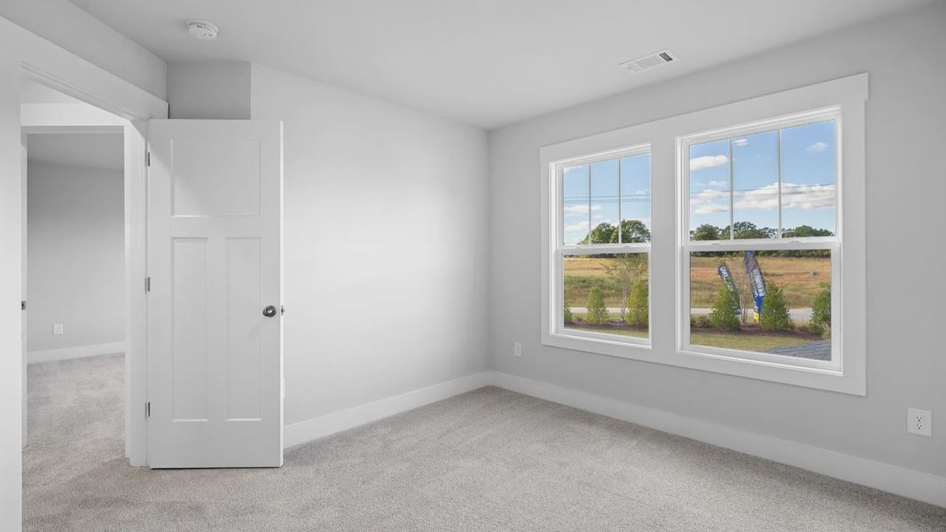 2 story single family home, all white, bedroom