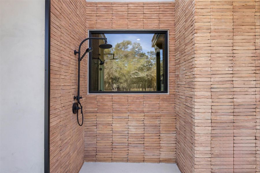 Full bathroom with a tile shower