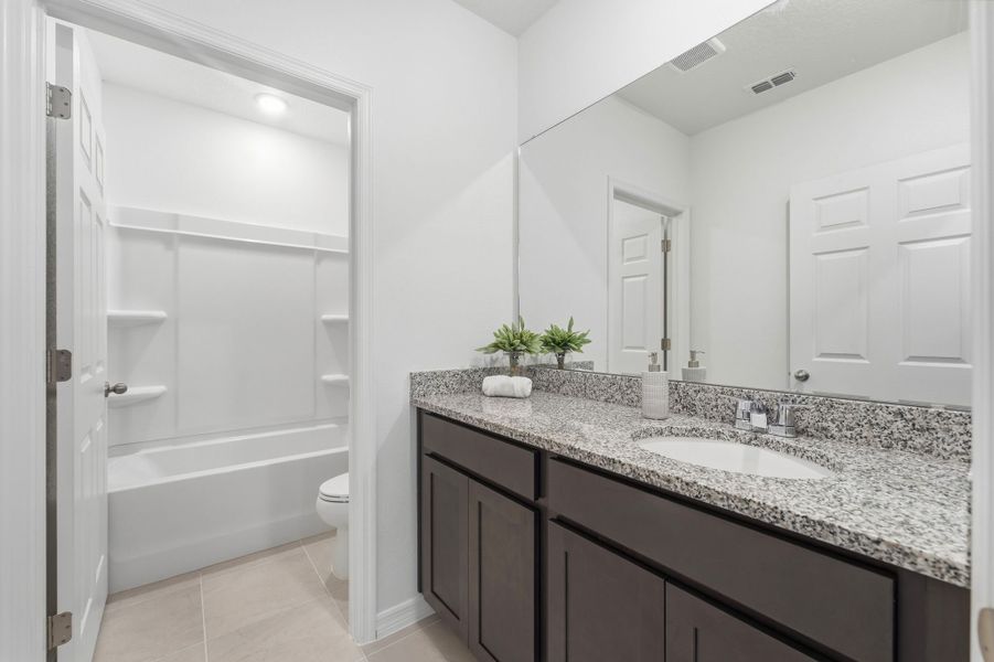 Furnished interior view inside a new home in Eagletail Landings, Howey-in-the-Hills (Image 3).