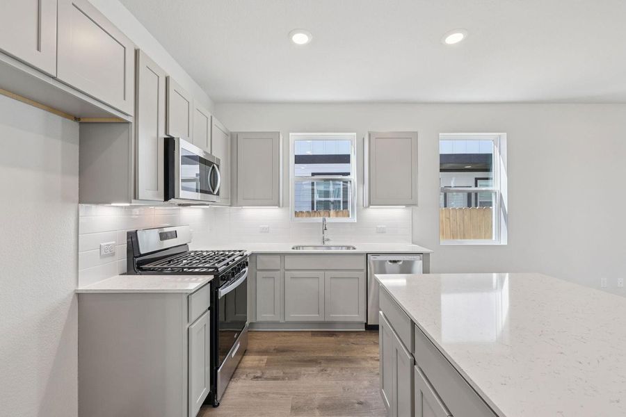 Furnished interior view inside a new home in The Hollows at Avery Centre, Round Rock (Image 9).