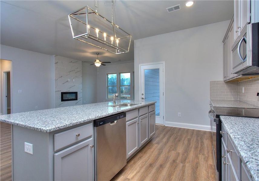 Furnished interior view inside a new home in , Homer (Image 4). Furnished interior view inside a new home in , Homer (Image 4).