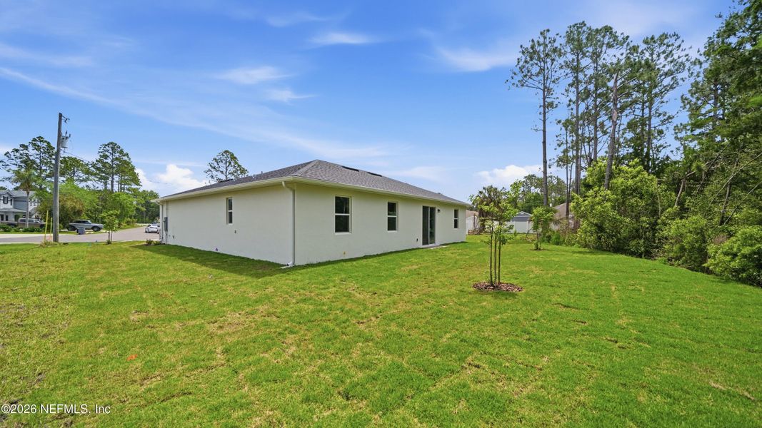 Exterior details and patio area of a home in Palm Coast, Palm Coast (Image 26).