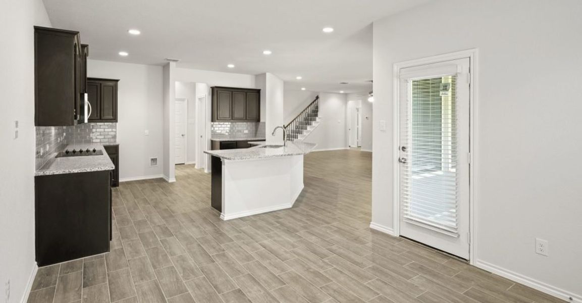 Representative exterior photo of a completed home built from the Hadleigh by Impression Homes in Mountain Valley, Burleson, TX (Image 9). Representative exterior photo of a completed home built from the Hadleigh by Impression Homes in Mountain Valley, Burleson, TX (Image 9).