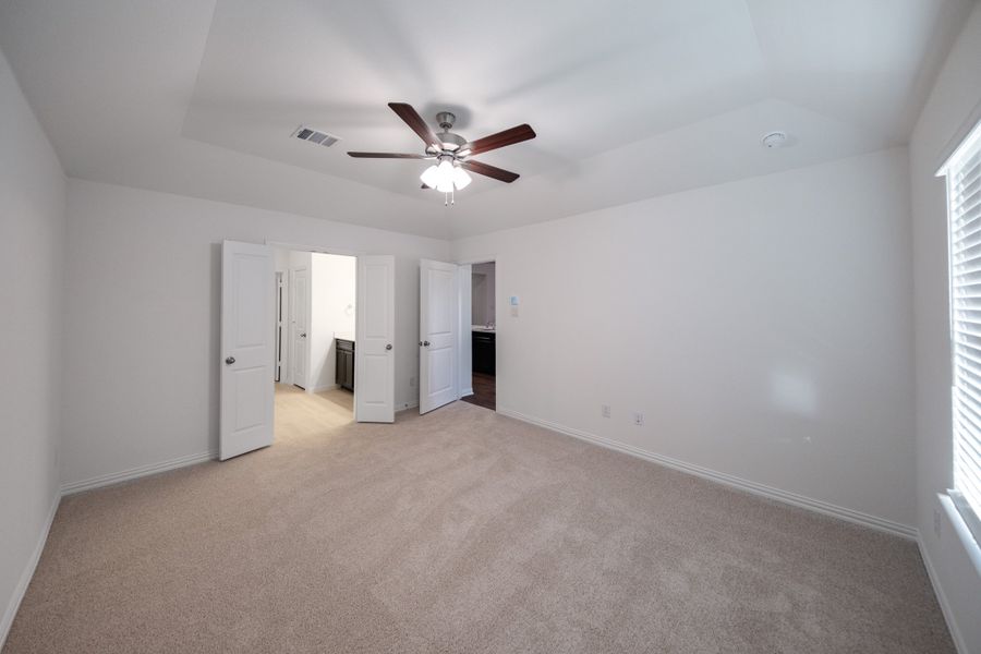 Spacious, unfurnished interior of a new home in The Villages of Hurricane Creek, Anna (Image 24).