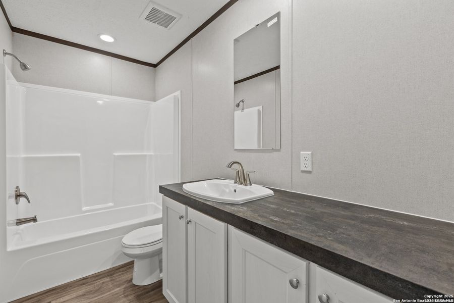 Furnished interior view inside a new home in , Jourdanton (Image 6).