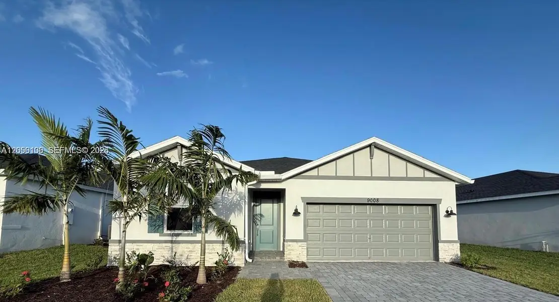 Front exterior of a new home in , Port St. Lucie, FL, highlighting curb appeal (Image 1). Front exterior of a new home in , Port St. Lucie, FL, highlighting curb appeal (Image 1).