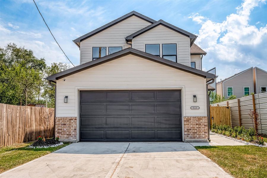Front exterior of a new home in , Houston, TX, highlighting curb appeal (Image 21). Front exterior of a new home in , Houston, TX, highlighting curb appeal (Image 21).