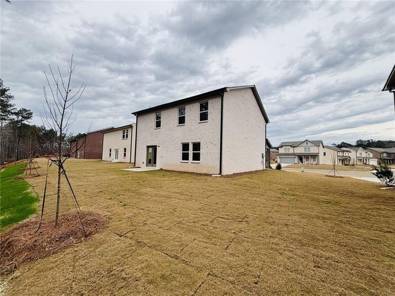 Exterior details and patio area of a home in Kendall Grove, McDonough (Image 3).