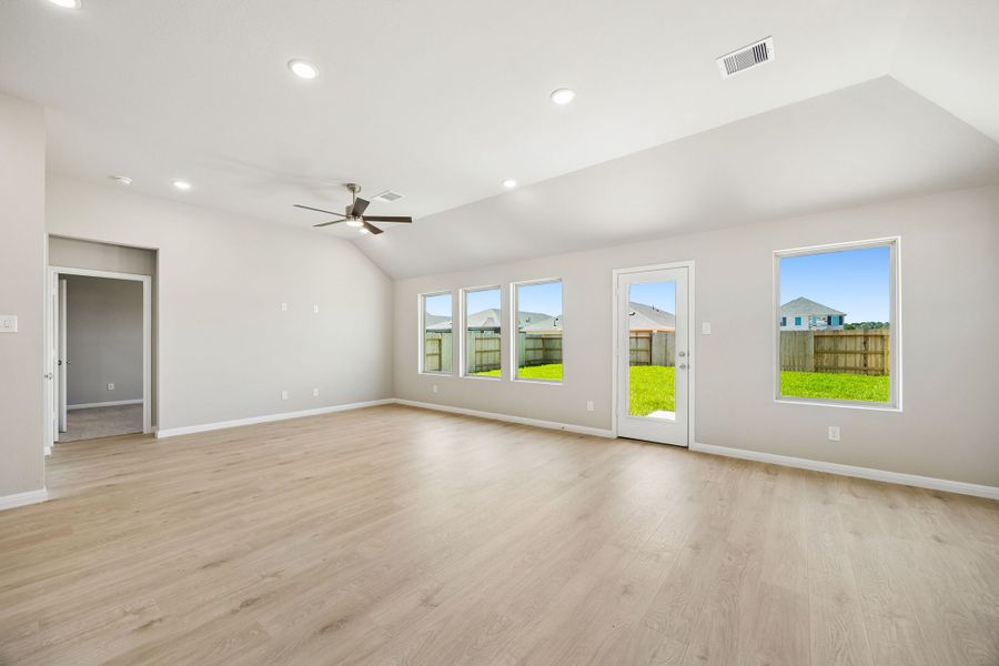 Living Room in the Sabine home plan by Trophy Signature Homes – REPRESENTATIVE PHOTO Living Room in the Sabine home plan by Trophy Signature Homes – REPRESENTATIVE PHOTO