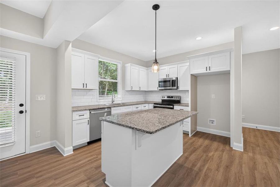 Furnished interior view inside a new home in , Monroe (Image 8).