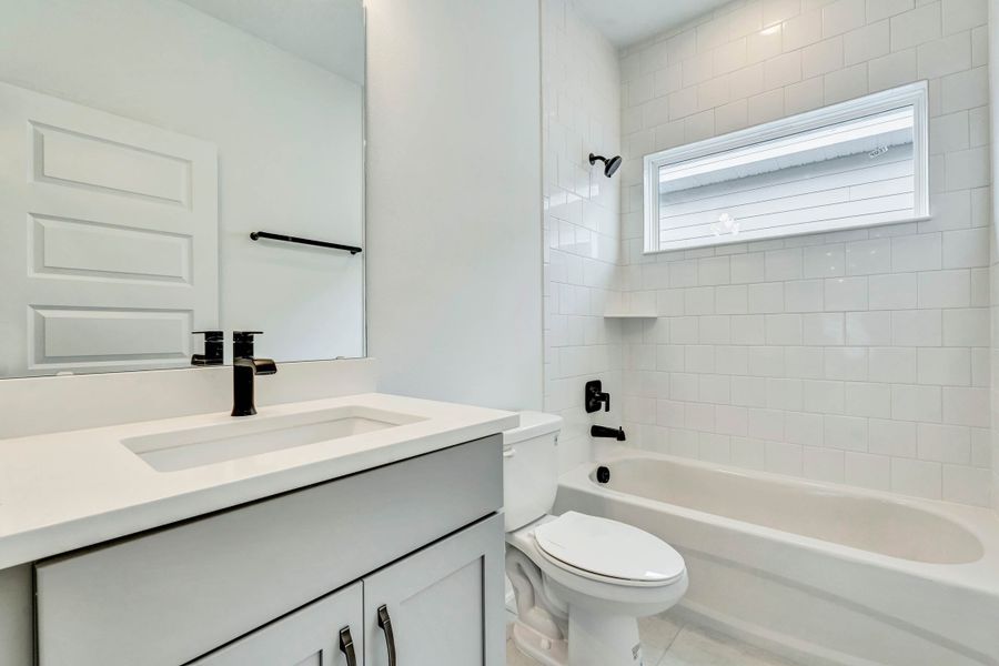 Representative furnished interior of a home built from the Faulkner by Rockwell Homes in Northlake At Ovation, Winter Garden (Image 17).