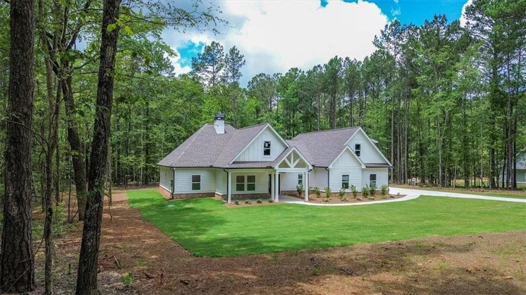 Front exterior of a new home in , Social Circle, GA, highlighting curb appeal (Image 21). Front exterior of a new home in , Social Circle, GA, highlighting curb appeal (Image 21).