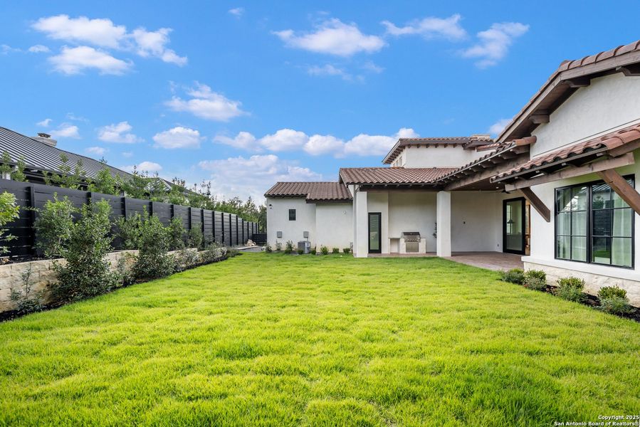 Exterior details and patio area of a home in , San Antonio (Image 26).
