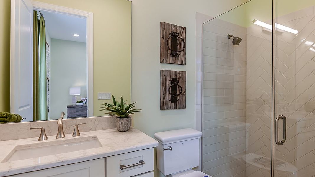 Furnished interior view inside a new home in Esplanade Lake Club, Fort Myers (Image 14).