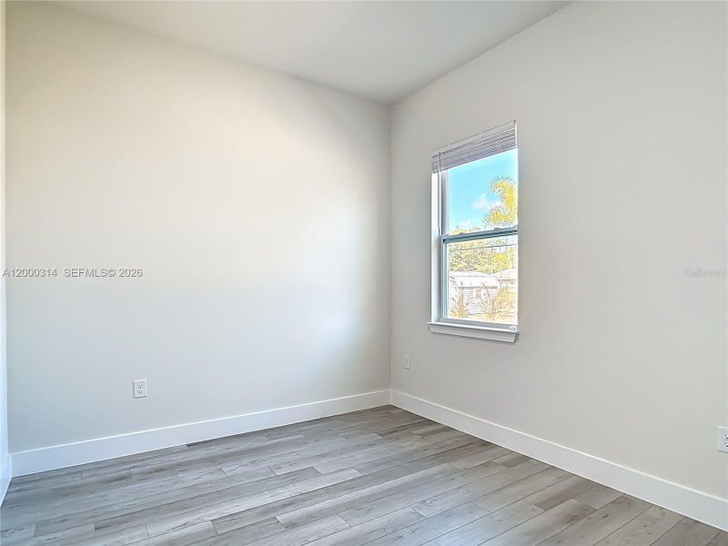 Spacious, unfurnished interior of a new home in , Port Charlotte (Image 15).