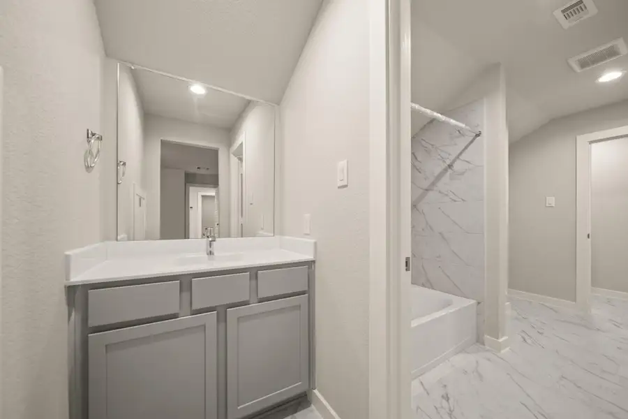 Furnished interior view inside a new home in Barton Creek Ranch, Conroe (Image 6).