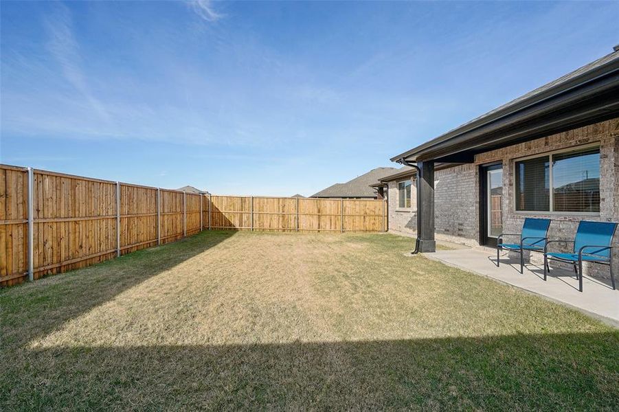 View of yard featuring a patio