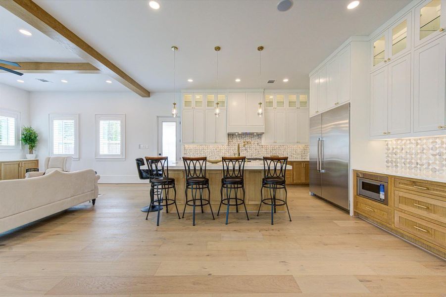 Luxury kitchen appliances by Thermador, incl a built-in micro and 60-inch columnar Freezer-Fridge.