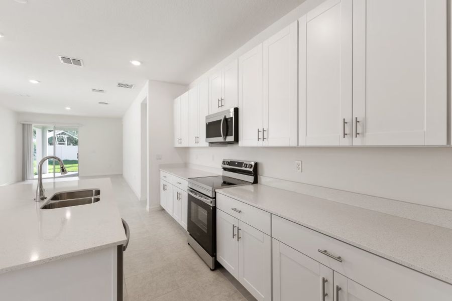 Furnished interior view inside a new home in Mirror Lake Village, Fruitland Park (Image 9). Furnished interior view inside a new home in Mirror Lake Village, Fruitland Park (Image 9).