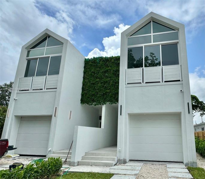 Front exterior of a new home in , Miami, FL, highlighting curb appeal (Image 24).