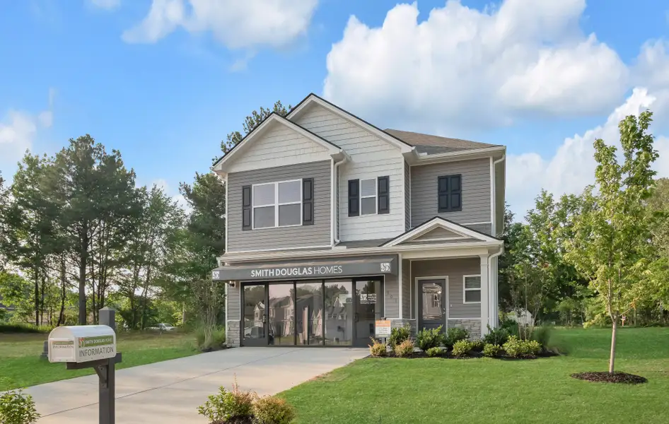 Front exterior of a new home in Cantigny Park, Clarksville, TN, highlighting curb appeal (Image 1). Front exterior of a new home in Cantigny Park, Clarksville, TN, highlighting curb appeal (Image 1).
