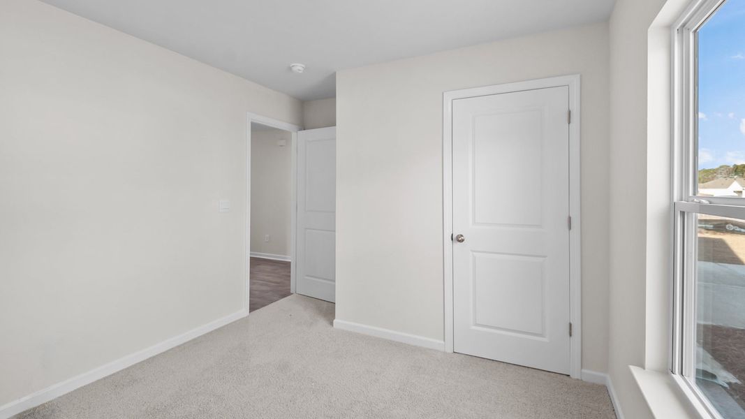 Spacious, unfurnished interior of a new home in Collett Farm, Trinity (Image 11). Spacious, unfurnished interior of a new home in Collett Farm, Trinity (Image 11).