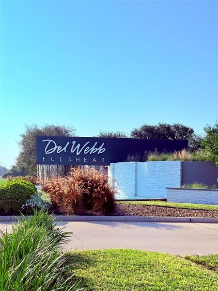 Front exterior of a new home in , Fulshear, TX, highlighting curb appeal (Image 1).